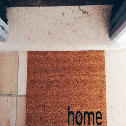 cozy home doormat at entryway