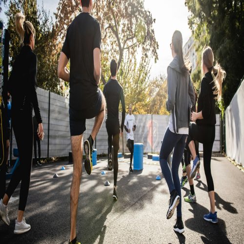 a group of people running on a road