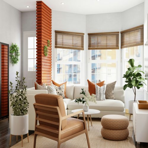 A cozy living room with a couch, chair, and table.