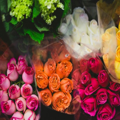 a bunch of flowers that are sitting on a table